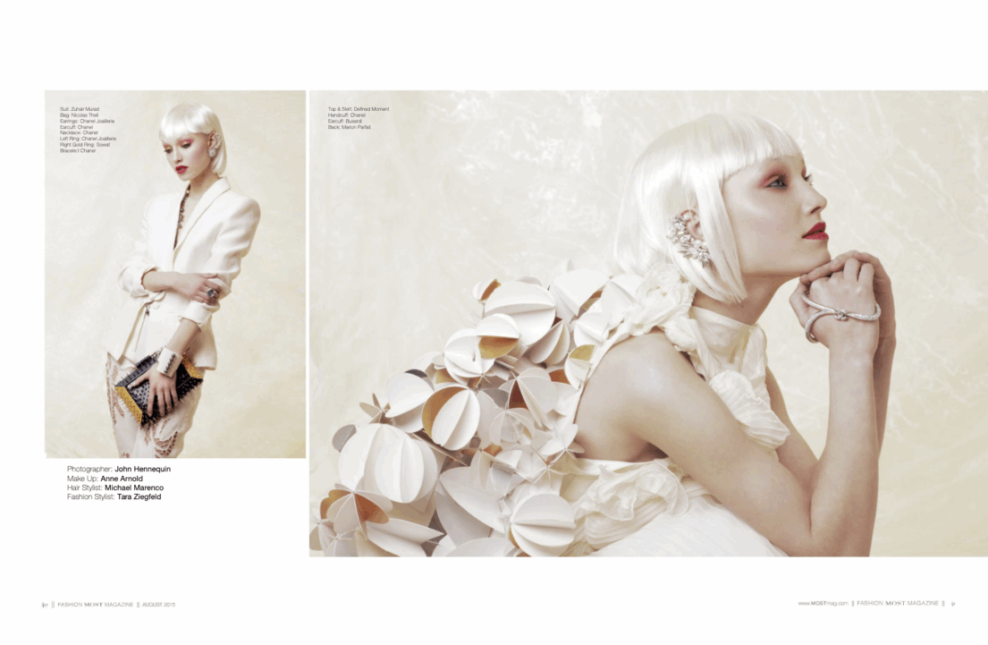Fashion editorial featuring a model with white hair wearing an avant-garde dress by Taro Dressel.