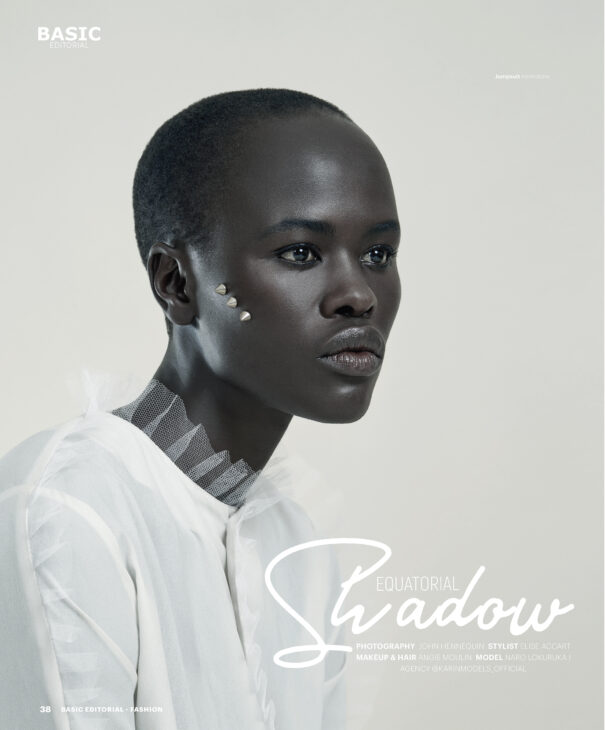Fashion editorial featuring a model with short hair and geometric earrings, styled by Elise Agnart.